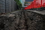 Ground works for a land drain sytem running parallel to the bottom fence.