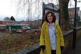 Darley Ward councillor, Alison Martin, on Darley Lane making use of the green's notice board.