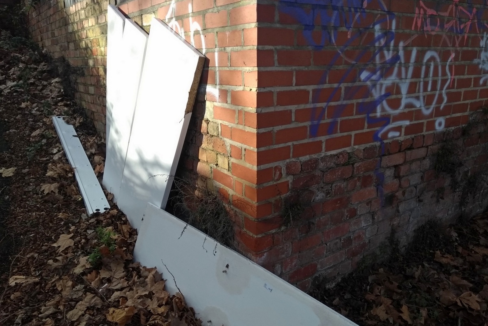 More fly tipping on the green. A pile of old shelves tossed over the wall near River Street. Someone else's problem now.